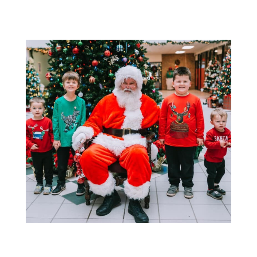 santa with kids at avery center