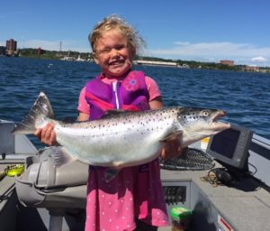 child catches big fish