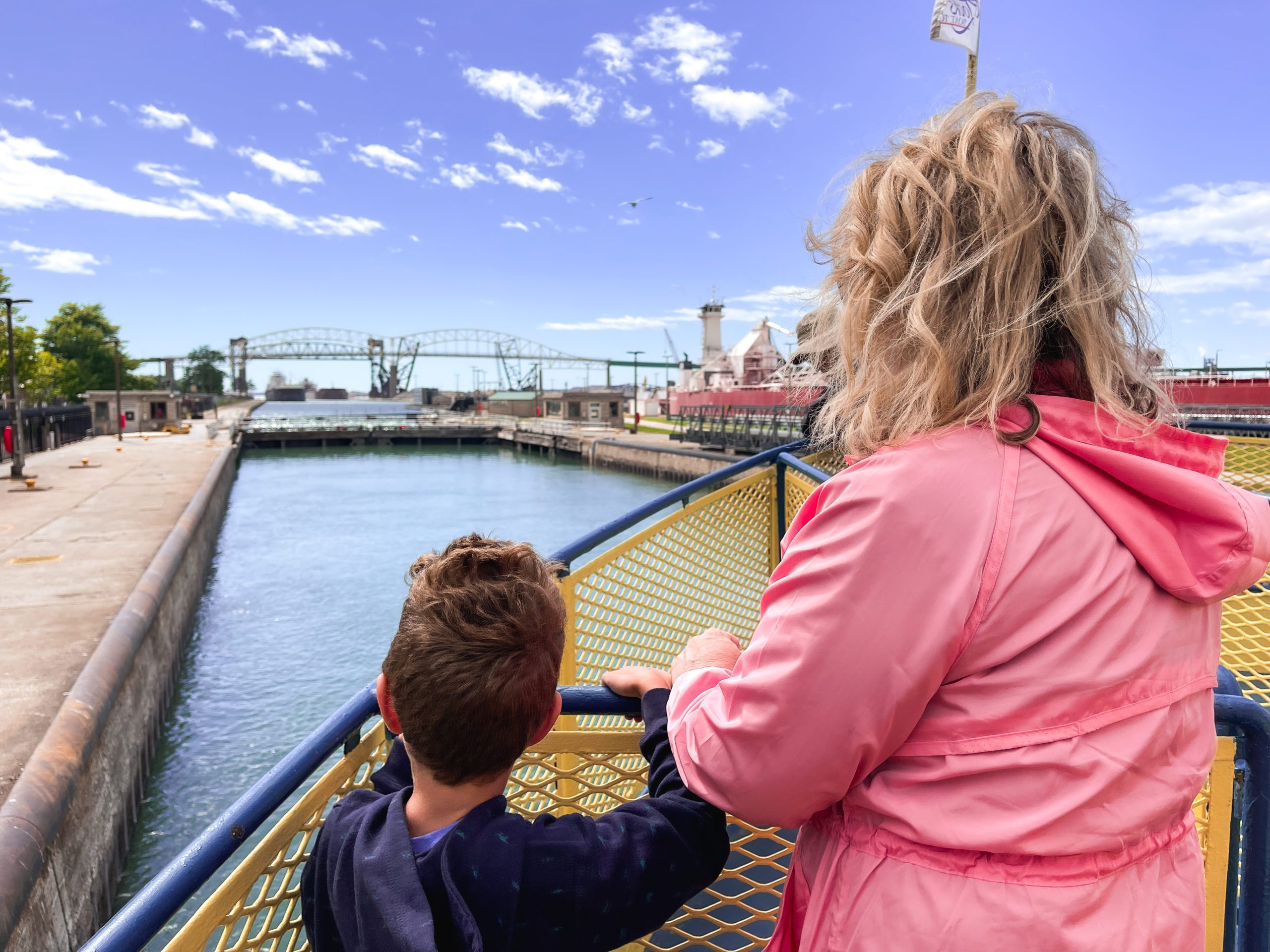 mom and son at sault locks boat tour