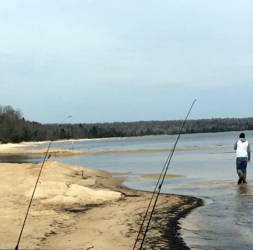 Pendills Creek Fishing with person walking along the shore